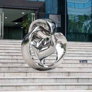 Modern stainless steel abstract sculpture and elegant artistic decoration